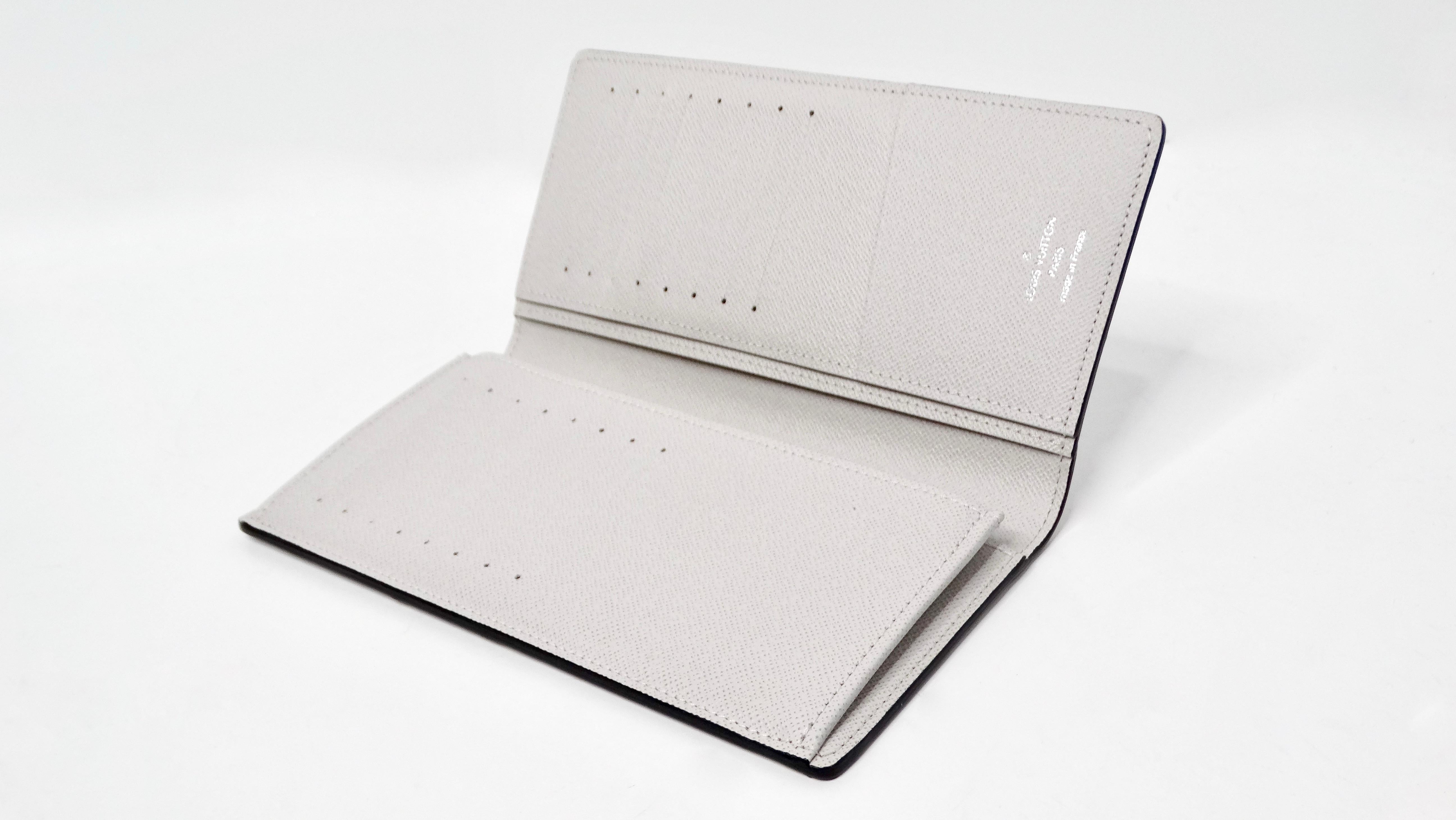The Louis Vuitton Grey Brazza Monogram Canvas Leather Wallet effortlessly combines elegance and practicality, making it a must-have accessory for the modern individual. This beautifully designed wallet features a light grey canvas exterior adorned