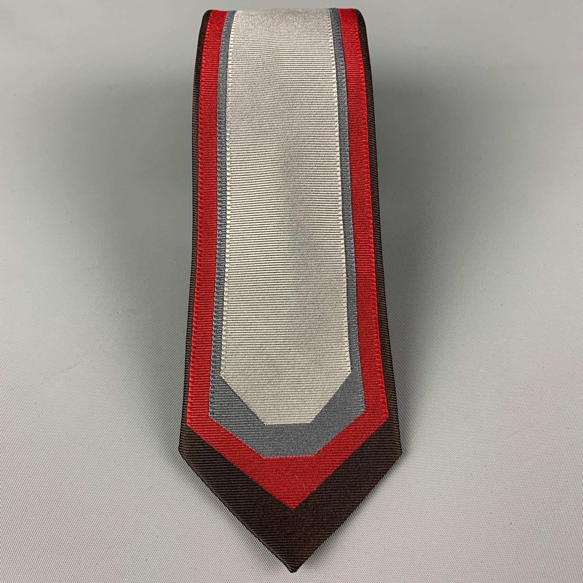 LOUIS VUITTON necktie comes in a grey & brown silk with a all over stripe print. Made in Italy.

Very Good Pre-Owned Condition.

Measurements:

Width: 3 in.
Length: 60 in. 