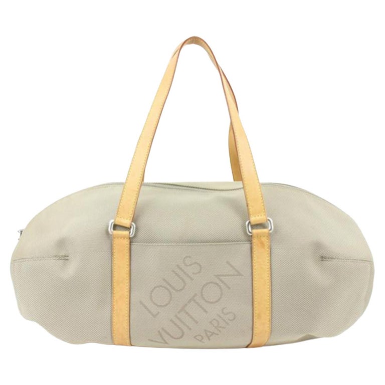 Sold at Auction: Louis Vuitton, Louis Vuitton Rolling Duffel Bag  (UNAUTHENTICATED)