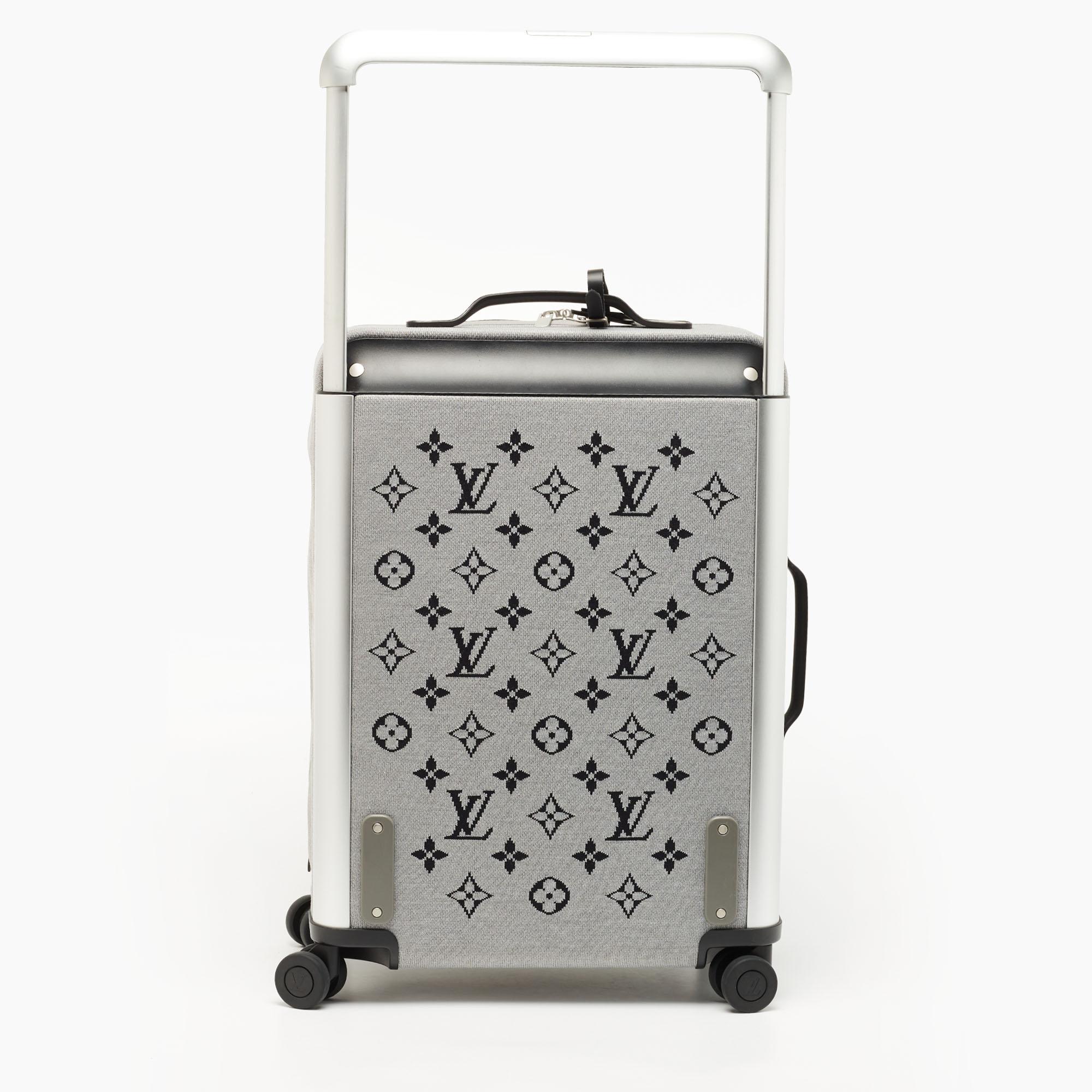 Taking Louis Vuitton's legendary art of travel elegantly forward, this suitcase, crafted from signature materials, flaunts traditional craftsmanship and an innovative, modern design. Lightweight, robust, and ultra-mobile, it glides along smoothly on