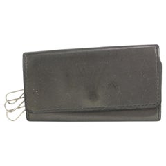 Louis Vuitton Monogram Leather Metallic Navy Nacre Empreinte Key Pouch Cles  34L2 For Sale at 1stDibs