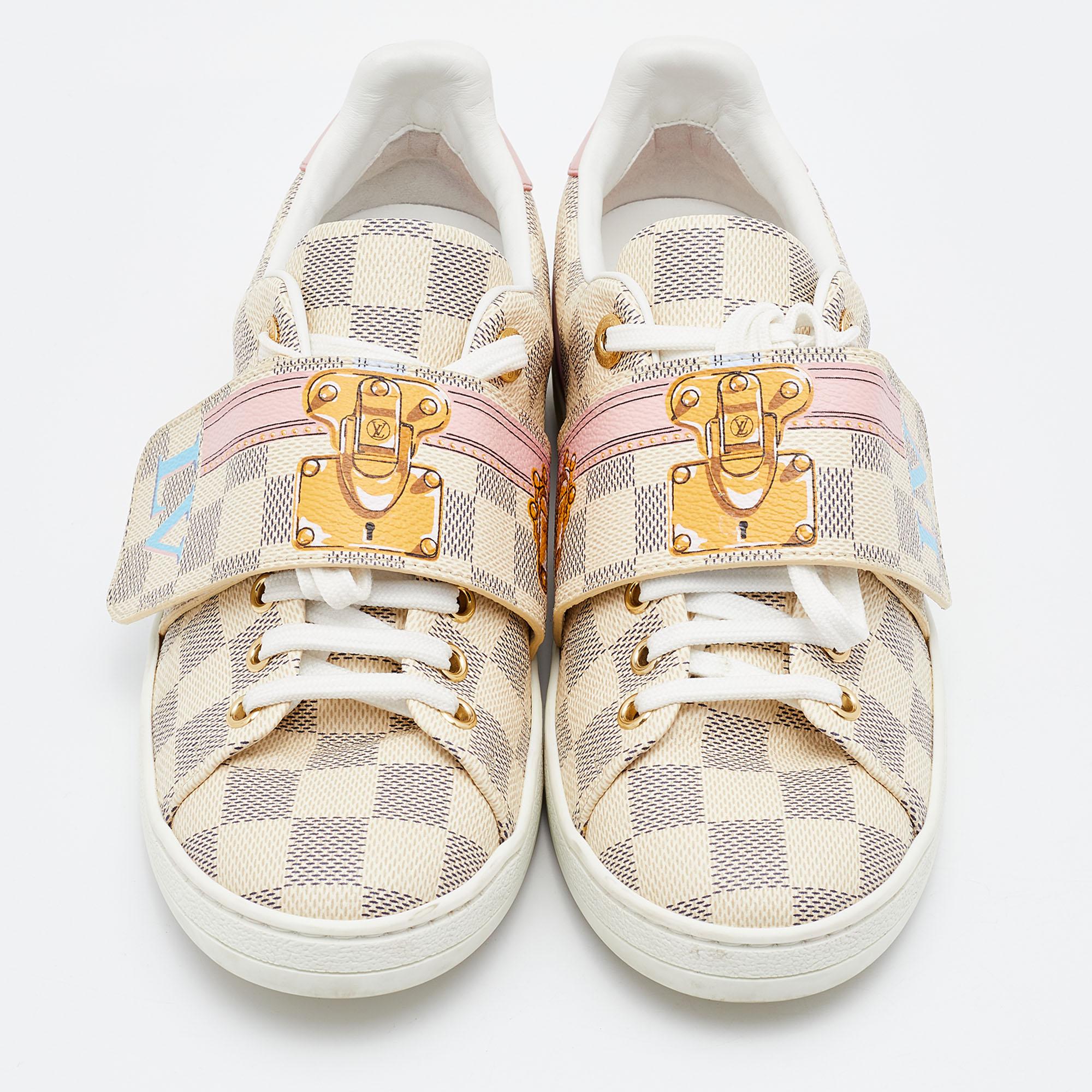 You'll love wearing these Summer Trunks sneakers from Louis Vuitton! The sneakers are crafted from Damier Azur canvas and feature round toes and a velcro strap over the lace-up vamps. They are finished with comfortable leather-lined