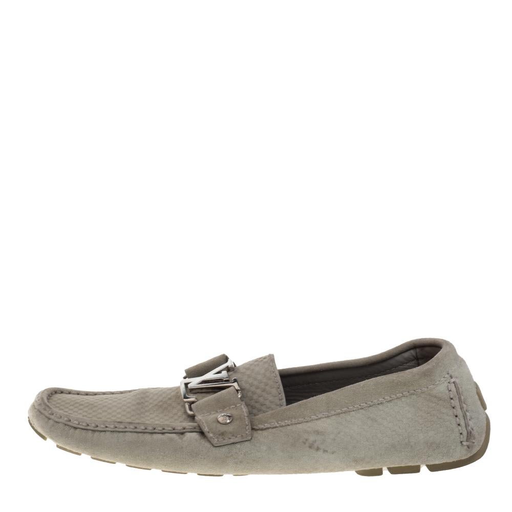 Louis Vuitton loafers are loved by men and women worldwide and are perfect for making a fashion statement. These grey Monte Carlo loafers are crafted from suede and feature a Damier Ebene check. They flaunt square toes, a silver-tone LV buckle