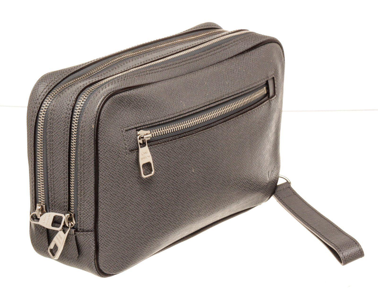 Louis Vuitton Grey Taiga Leather Neo Pavel Clutch Bag with material leather, silver-tone hardware, exterior zip pocket, interior slip pocket, and zipper closure.


41878MSC