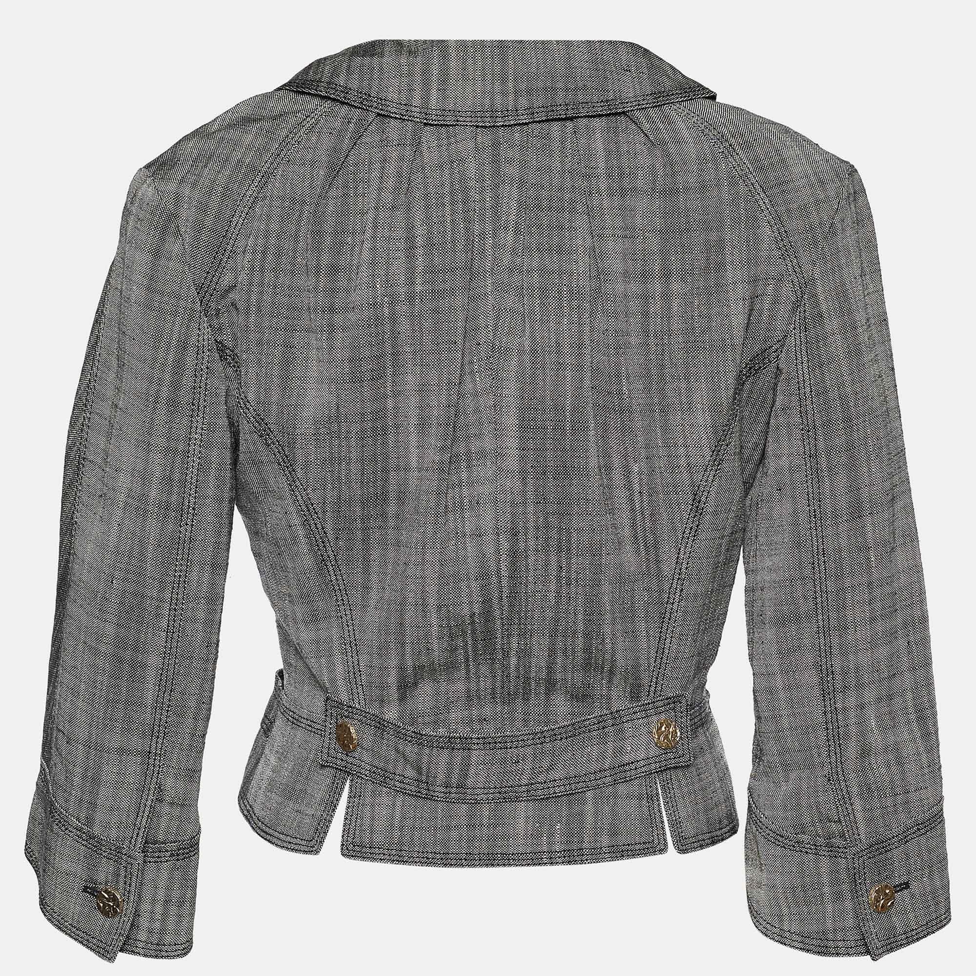 Louis Vuitton's sartorial taste is fine as it can get, and this stunning blazer is the evidence of that! Fashioned neatly from grey textured silk, this blazer carries a double-breasted profile with a cropped fit and gold-tone button embellishments.