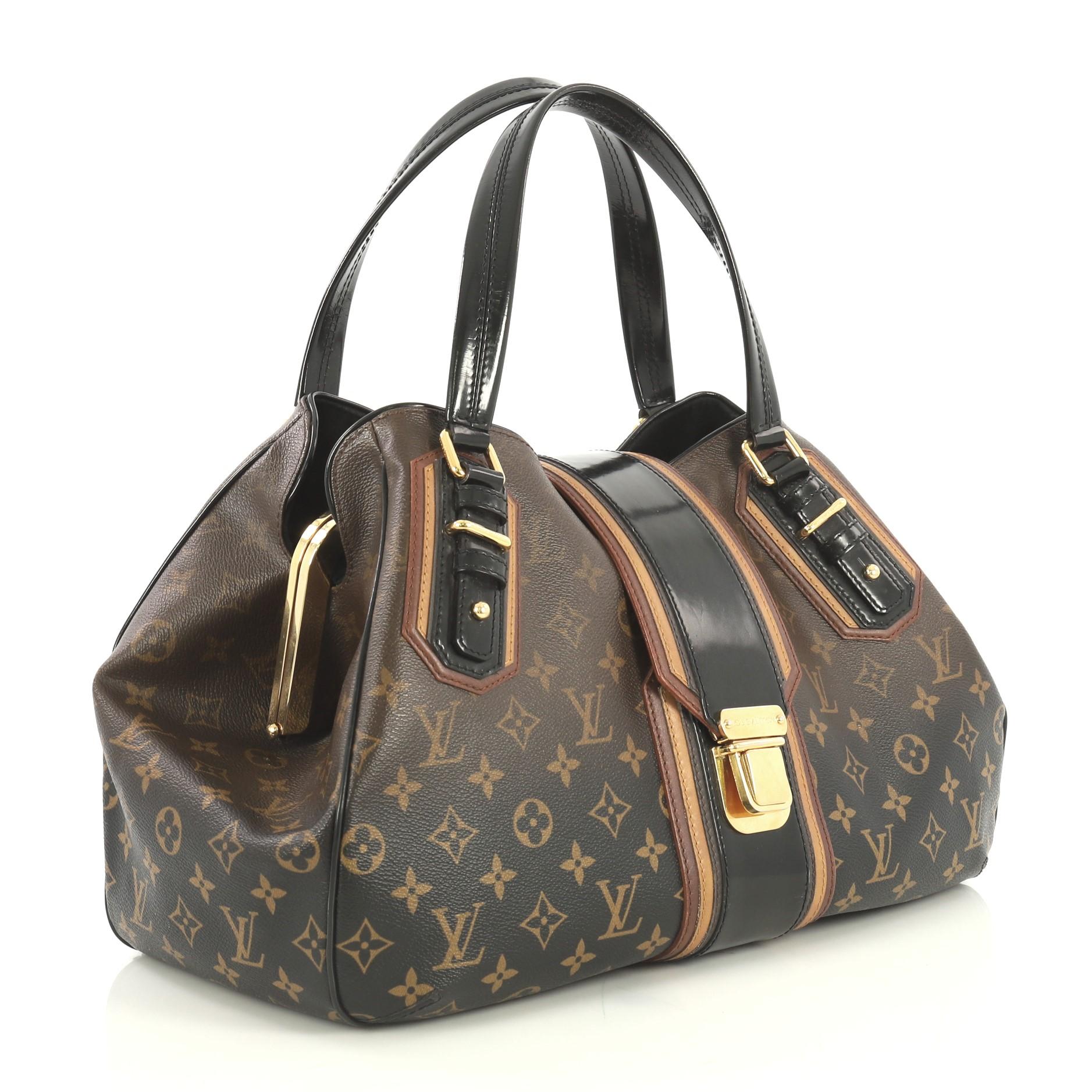 This Louis Vuitton Griet Handbag Limited Edition Monogram Mirage, crafted from brown monogram coated canvas, features black patent leather handles and trim, hidden golden frame, and gold-tone hardware. Its flap tab with push-lock closure opens to a