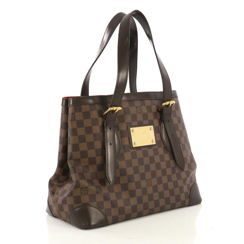 louis vuitton purse with gold plate