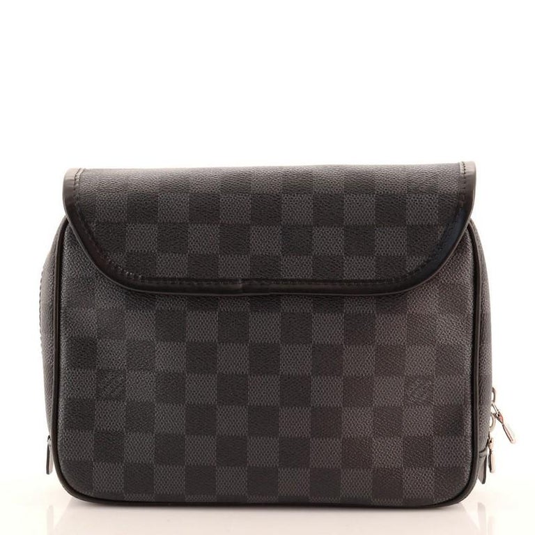 This Louis Vuitton Toletry Pouch in Damier Graphite canvas will