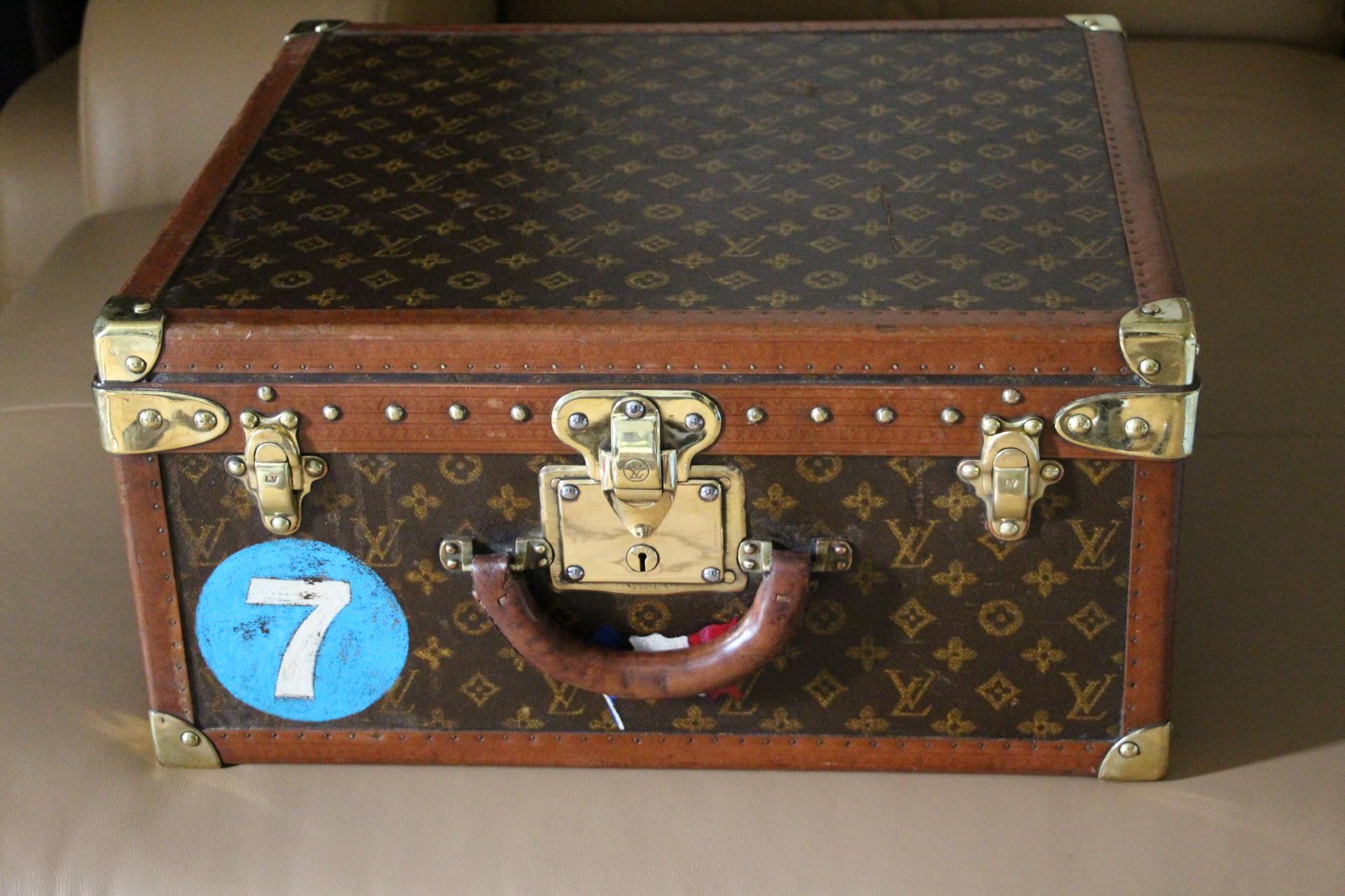 This beautiful 1930-1950's Louis Vuitton hat box features stenciled monogram canvas, brass fittings , corners, LV stamped lock and clasps and a very sturdy and comfortable leather handle. Its lock has been replaced by a Louis Vuitton original