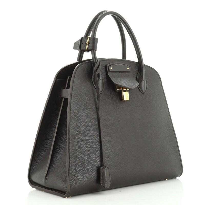 Estimated Retail Price: $9,000
Condition: Very good. Scuffs on exterior, moderate scuffs and indentations in interior, scratches on hardware.
Accessories: Keys, Lock, Poignet, Clochette
Measurements: Handle Drop 4