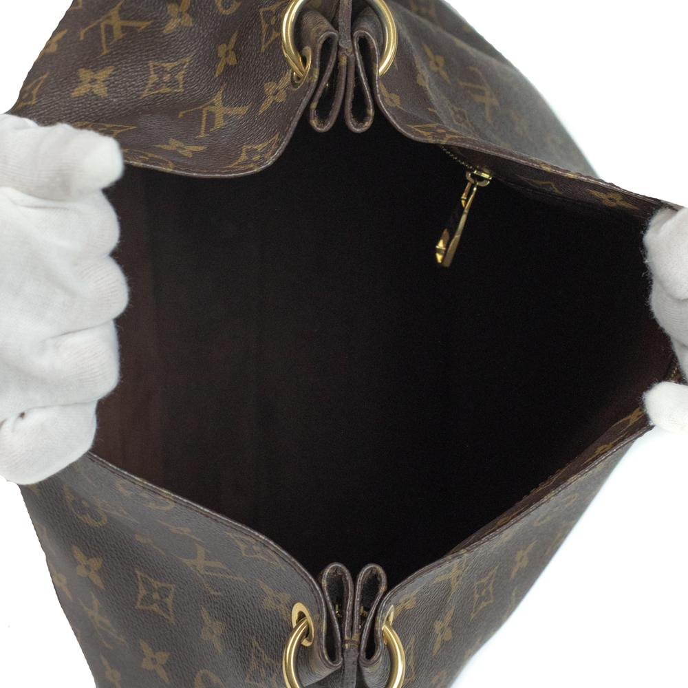 Black LOUIS VUITTON, Hobo Metis in brown monogram canvas