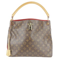 Sac cabas Louis Vuitton hobo Gaia en toile enduite marron avec monogramme 27lk1219