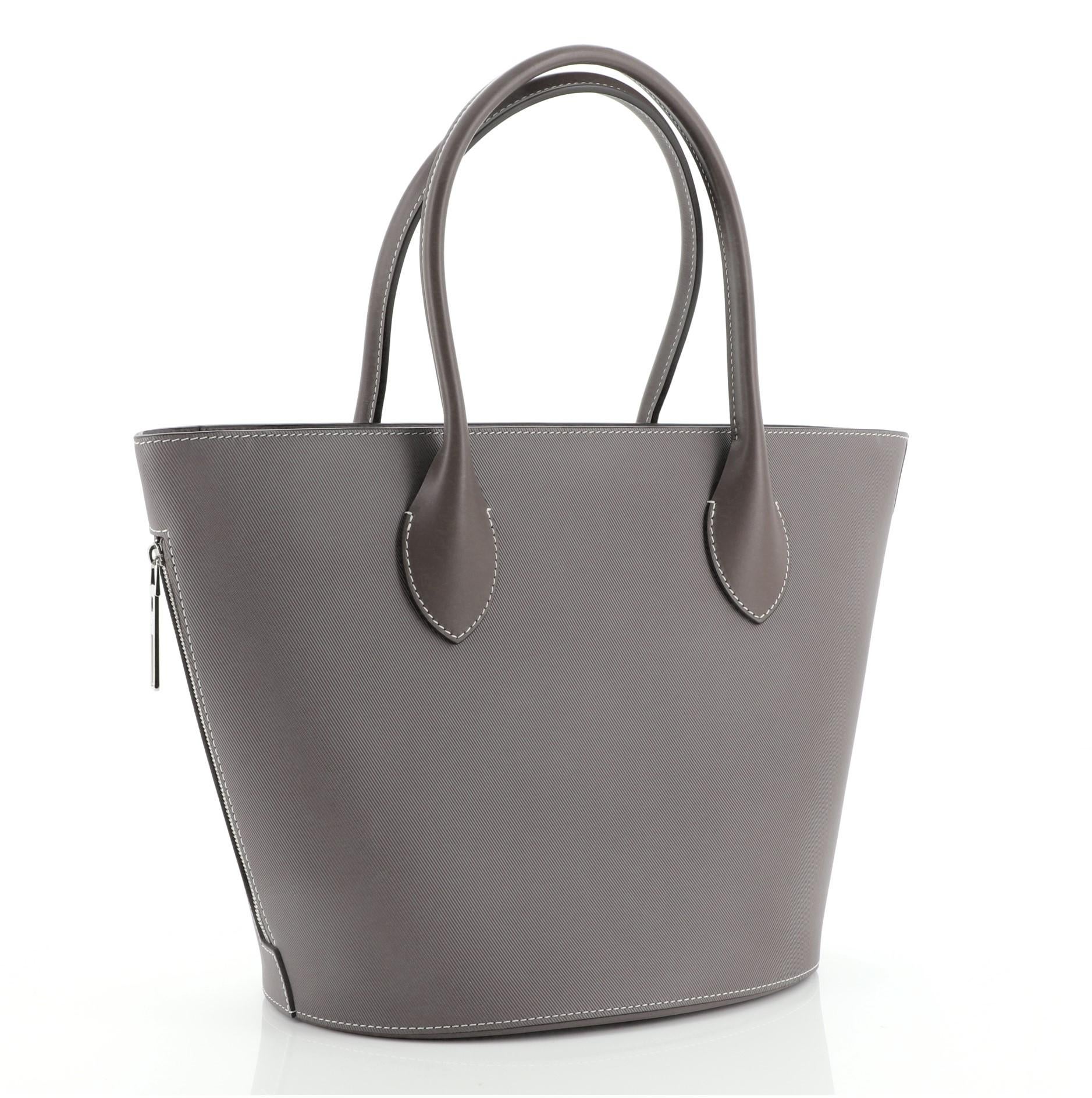 Louis Vuitton Holdall Tote Veau Satin Leather PM
Gray Satin Leather

Condition Details: Minor scuffs on exterior and handles, wear in interior, scratches on hardware.

44948MSC

Height 10