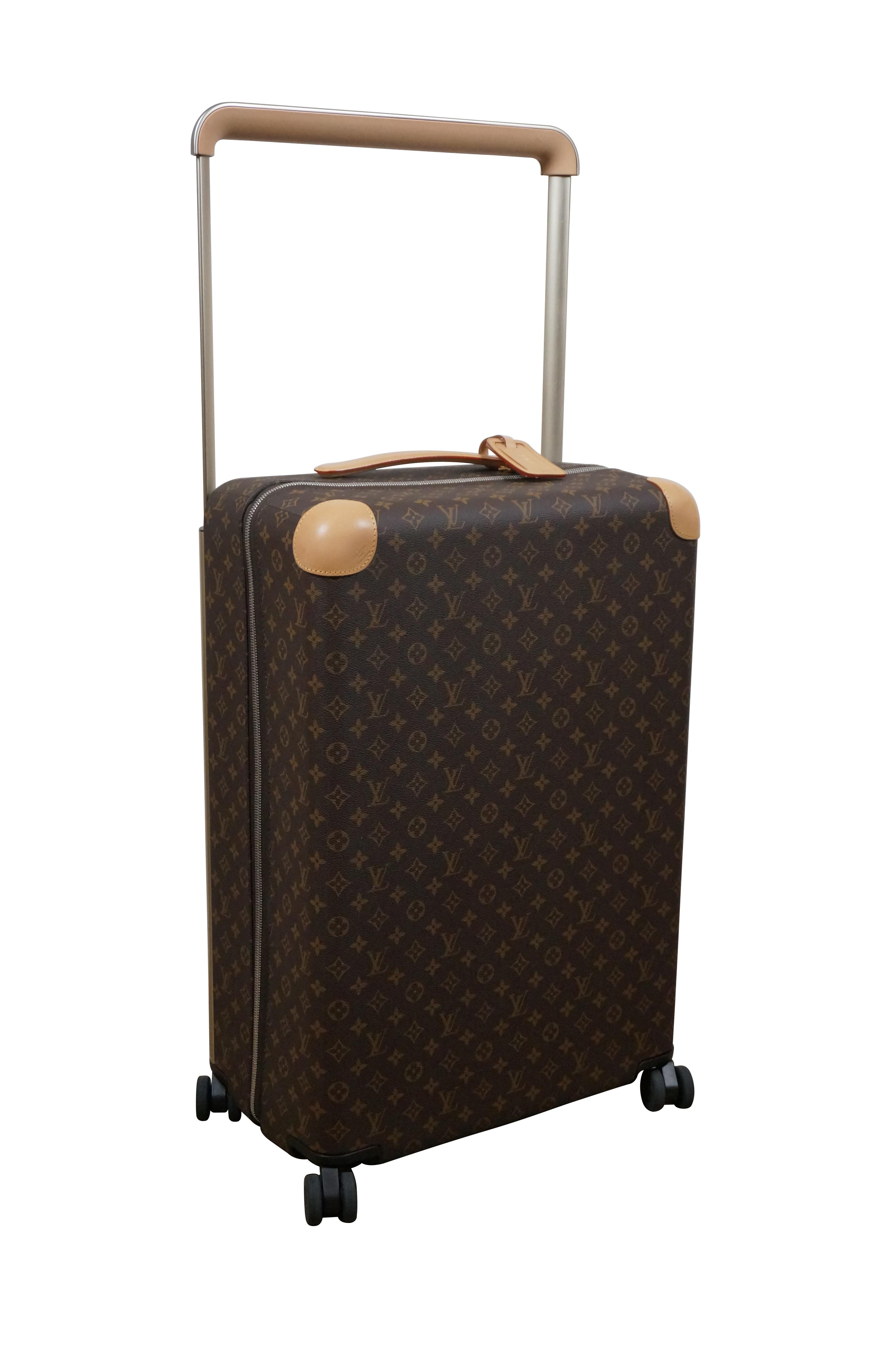 Louis Vuitton Paris Horizon 70 carry on sized rolling suitcase. 