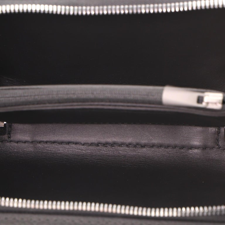 Louis Vuitton Horizon Clutch Monogram Taurillon Leather at 1stDibs