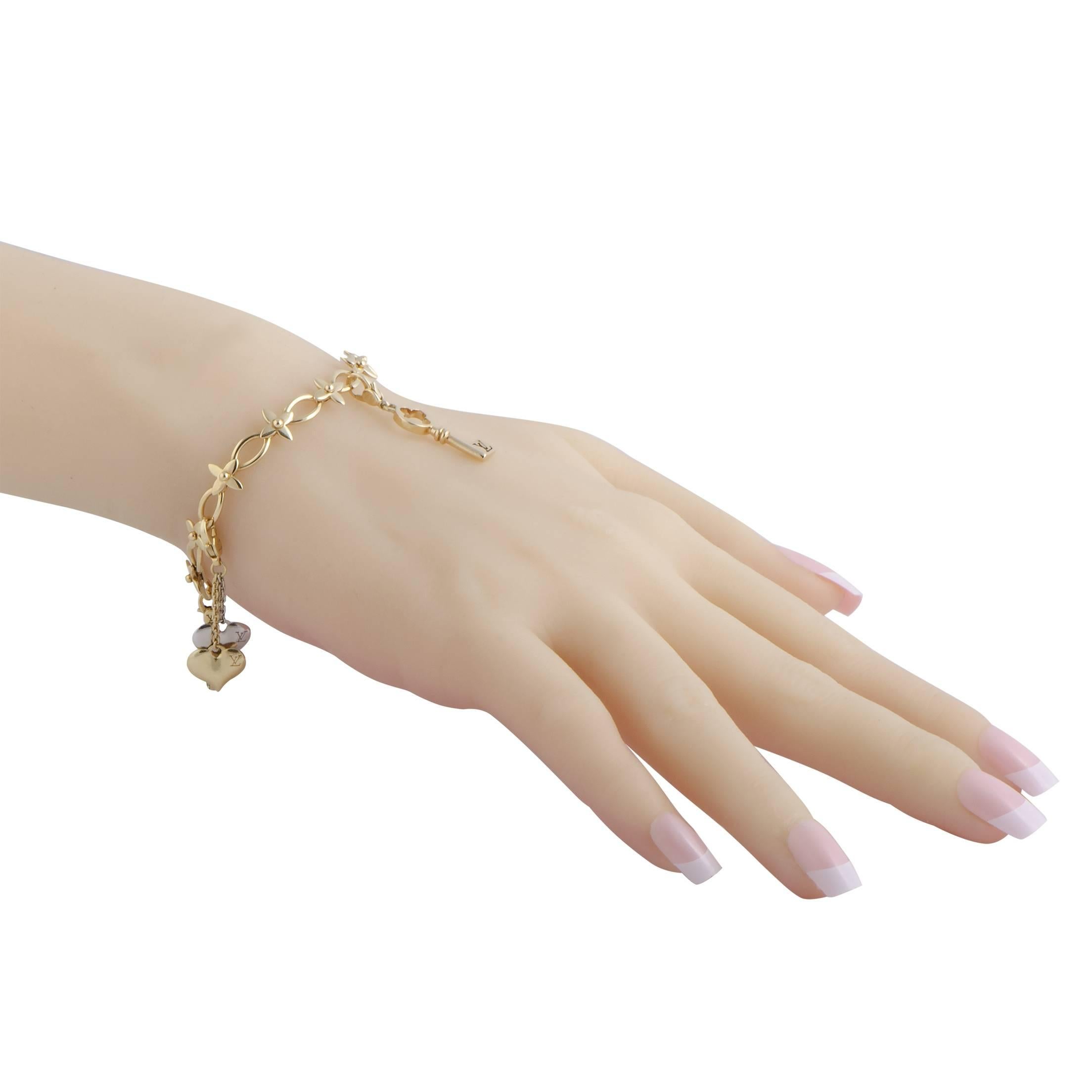 This gorgeous bracelet perfectly captures the spirit of Louis Vuitton designs, offering a look of timeless elegance and refinement. The bracelet is made of classic 18K yellow gold and embellished with diamond and peridot stones. 
