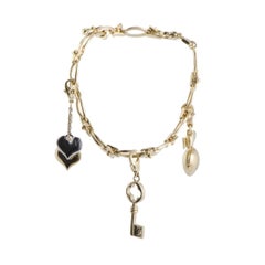 Louis Vuitton Idylle Blossom 18 Karat Gold Diamond and Peridot Charm Bracelet