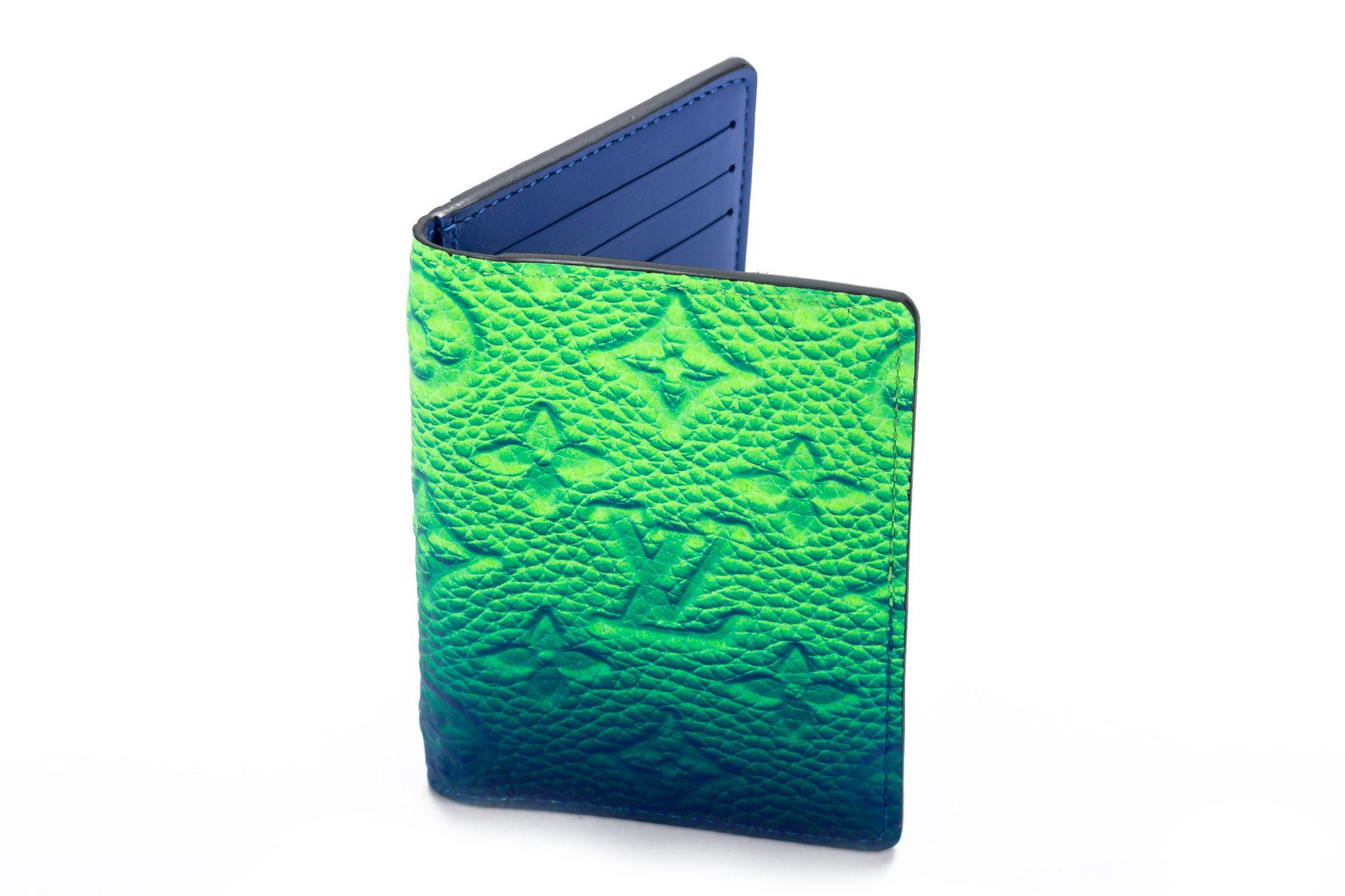 Beautiful credit card holder from the SS22 Louis Vuitton Virgil Abloh Illusion Mens collection. Stunning neon embossed leather with matching stitching. The classic Pocket Organizer, a practical all-in-one wallet, gets a futuristic make-over in