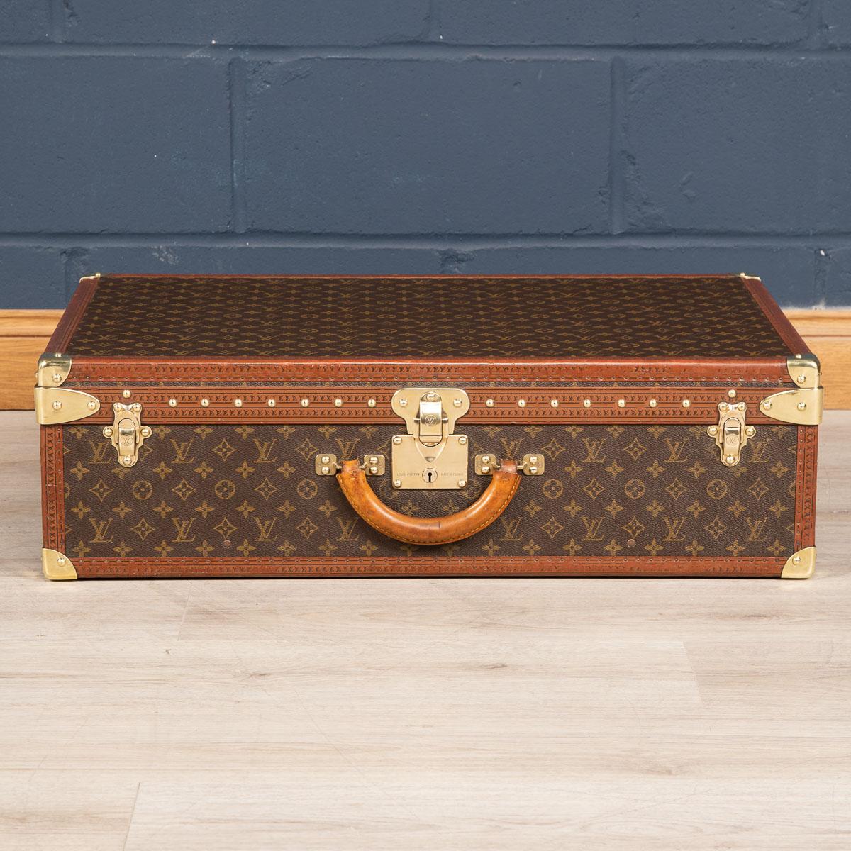 A charming Louis Vuitton hard-sided case, second half of the 20th century, the exterior finished in the famous monogram canvas with brass fittings. A great piece for use today or as an item for the home.

Please note that our interior pieces are