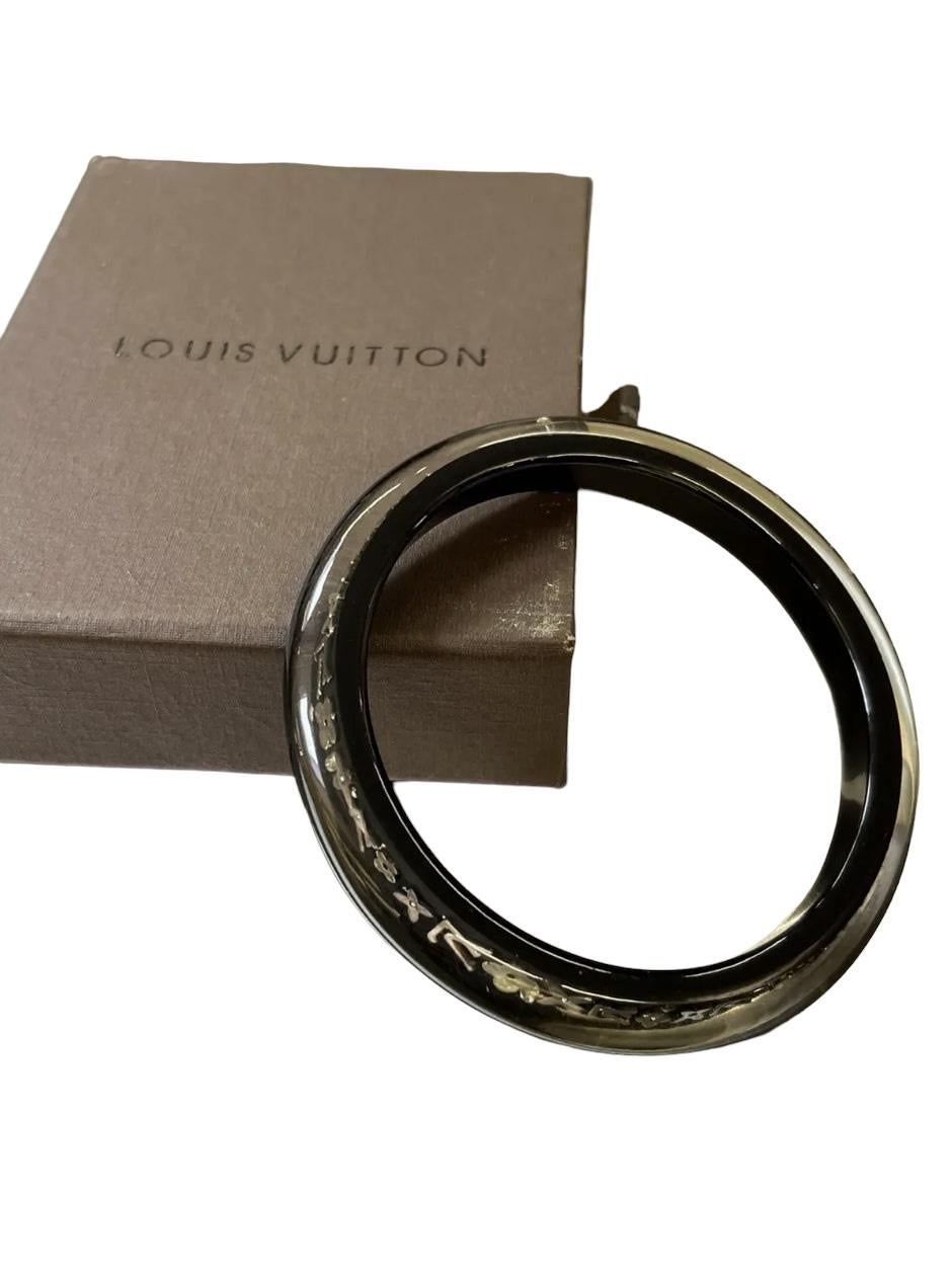 Louis Vuitton
Inclusion Monogram Bangle Bracelet

Beautiful Louis Vuitton Inclusion monogram bangle bracelet in black. In great condition without any flaws, comes with the original box and tags.