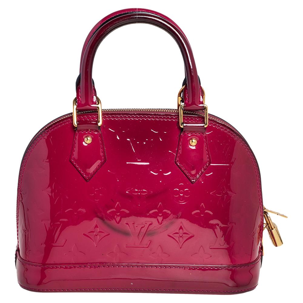 Out of all the irresistible handbags from Louis Vuitton, the Alma is the most structured one. First introduced in 1934 by Gaston-Louis Vuitton, the Alma is a classic that has received love from fashion icons. This piece comes crafted from Monogram