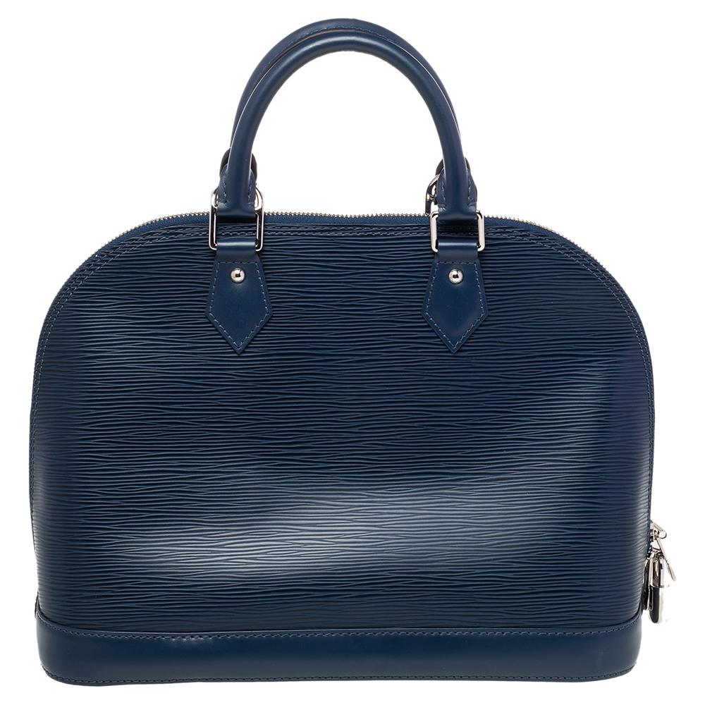 An icon of House Louis Vuitton, the Alma bag is easily one of the most popular bags that people invest in. Get yours today with this indigo Alma PM made of Epi leather. The bag is designed with double zippers, a padlock, and an alcantara interior.