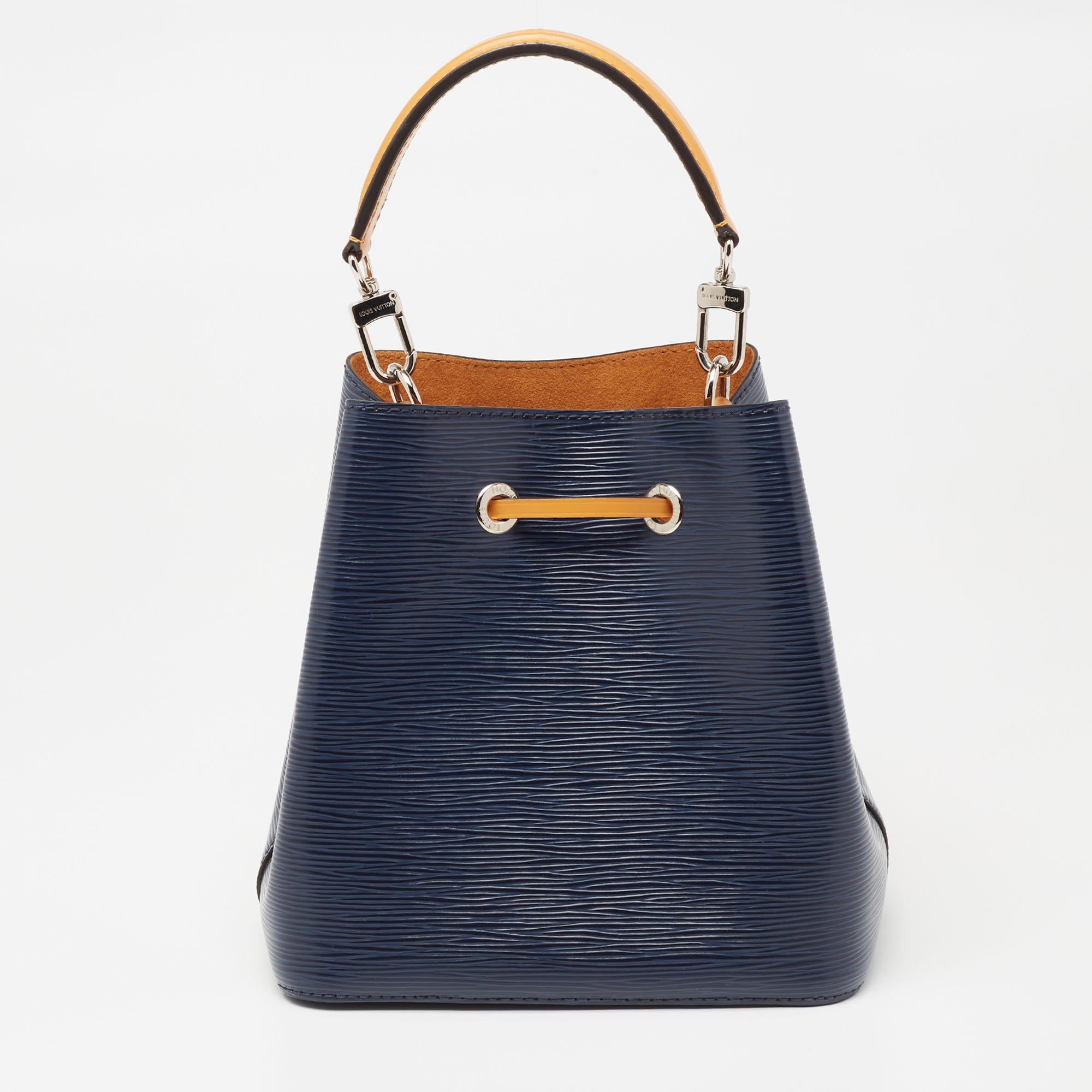 The NéoNoé from Louis Vuitton was first introduced for Spring 2017 and is a modernized update of the classic Noé Bag. With minimal design but striking elements, this bag will win your vote as your favorite handbag. Created from Epi leather in indigo