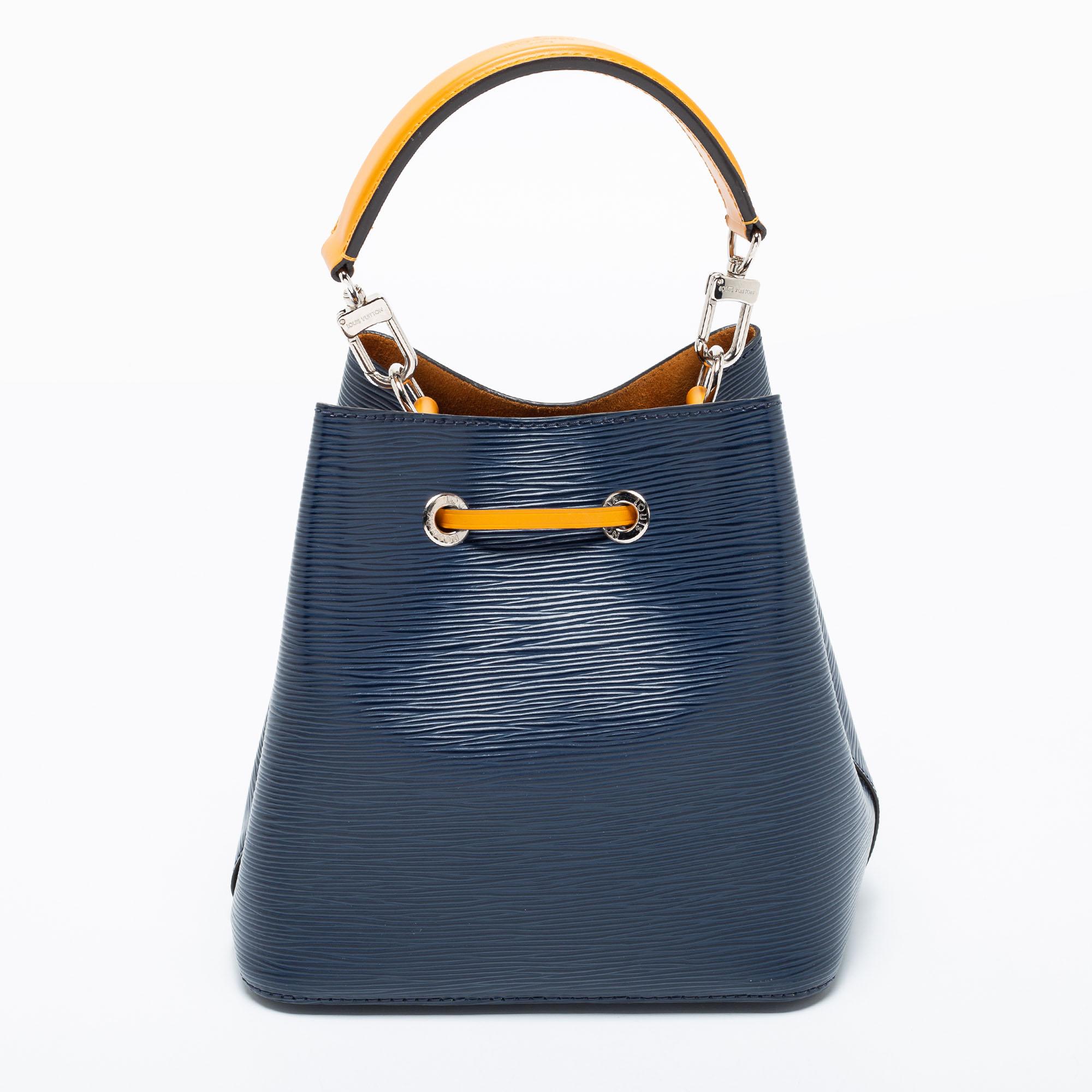 The NéoNoé from Louis Vuitton is a modernized update of the classic Noé Bag. With minimal design but striking elements, this bag will win your vote as your favorite handbag. Created from Epi leather in gorgeous colors, it features silver-tone