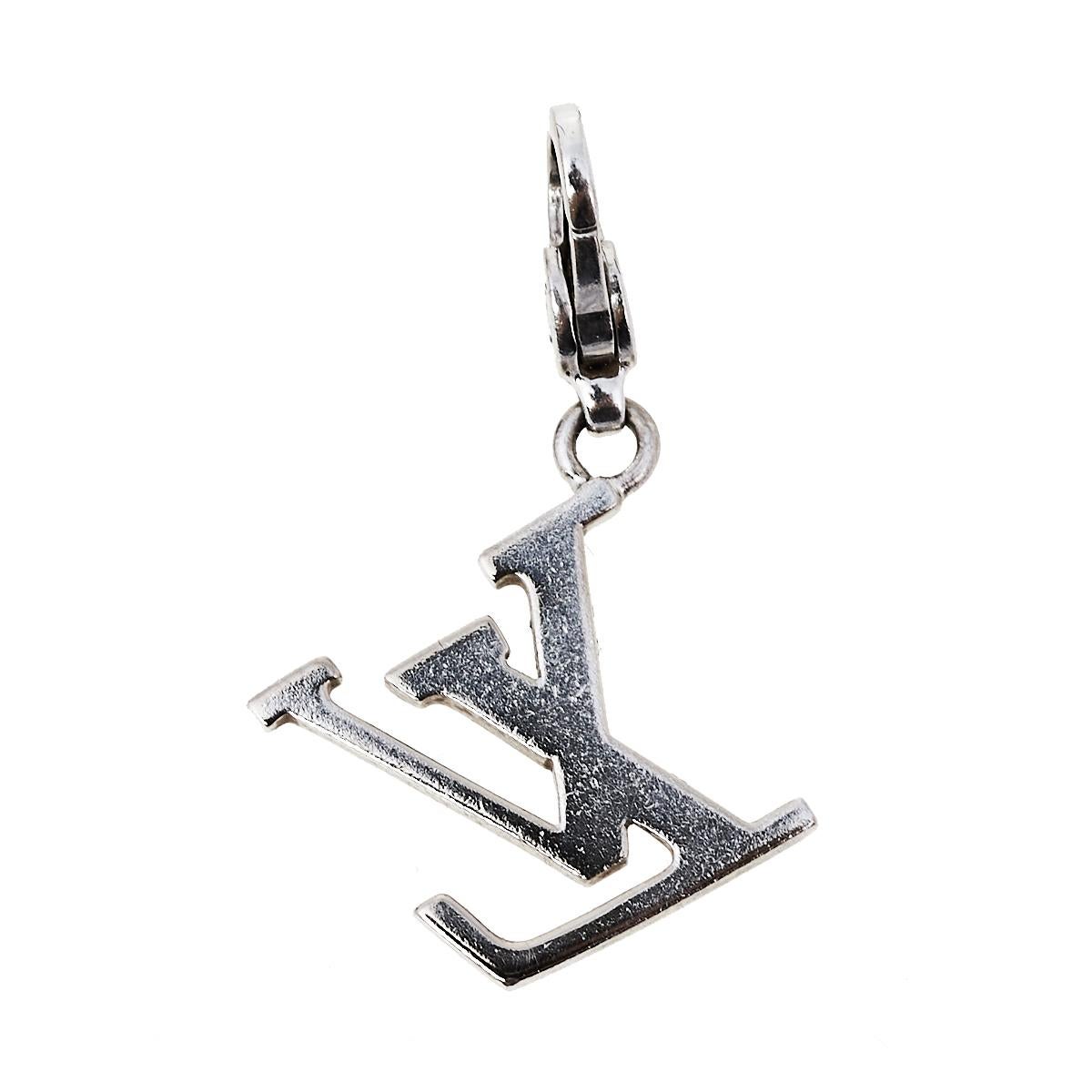 Charms always add more character to anything that it is attached to. Flaunt your love for the brand with this gorgeous charm in the brand monogram made out of stunning 18k white gold. Glam up your bag or add it to your charm bracelet, as you