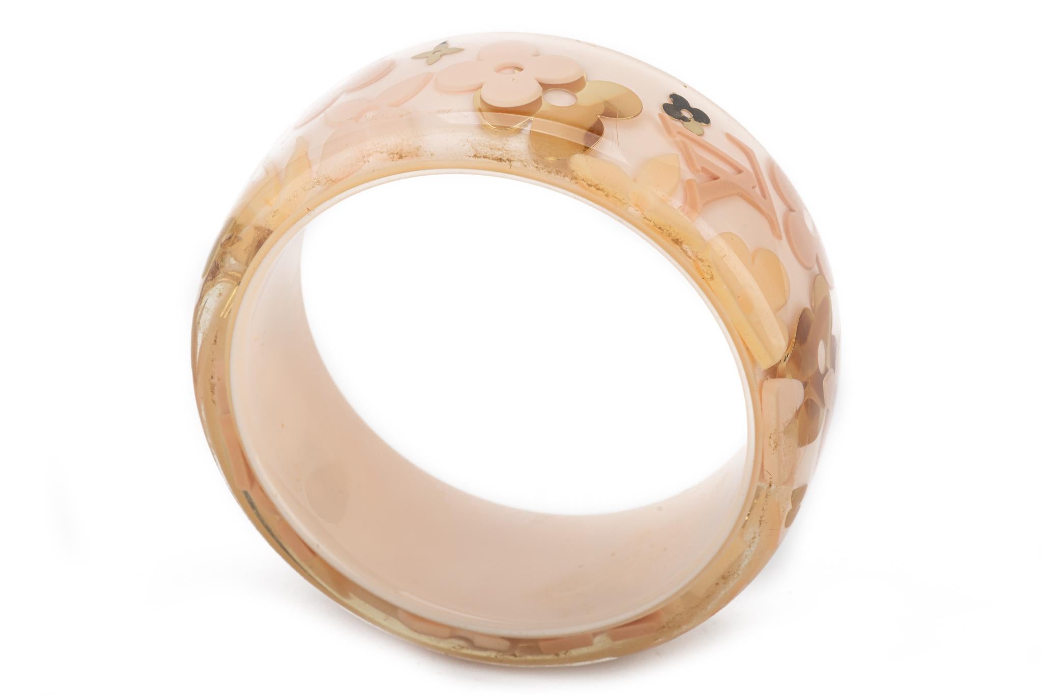 Louis Vuitton inlay bracelet with logo, light pink color. Excellent condition. Comes with original box.