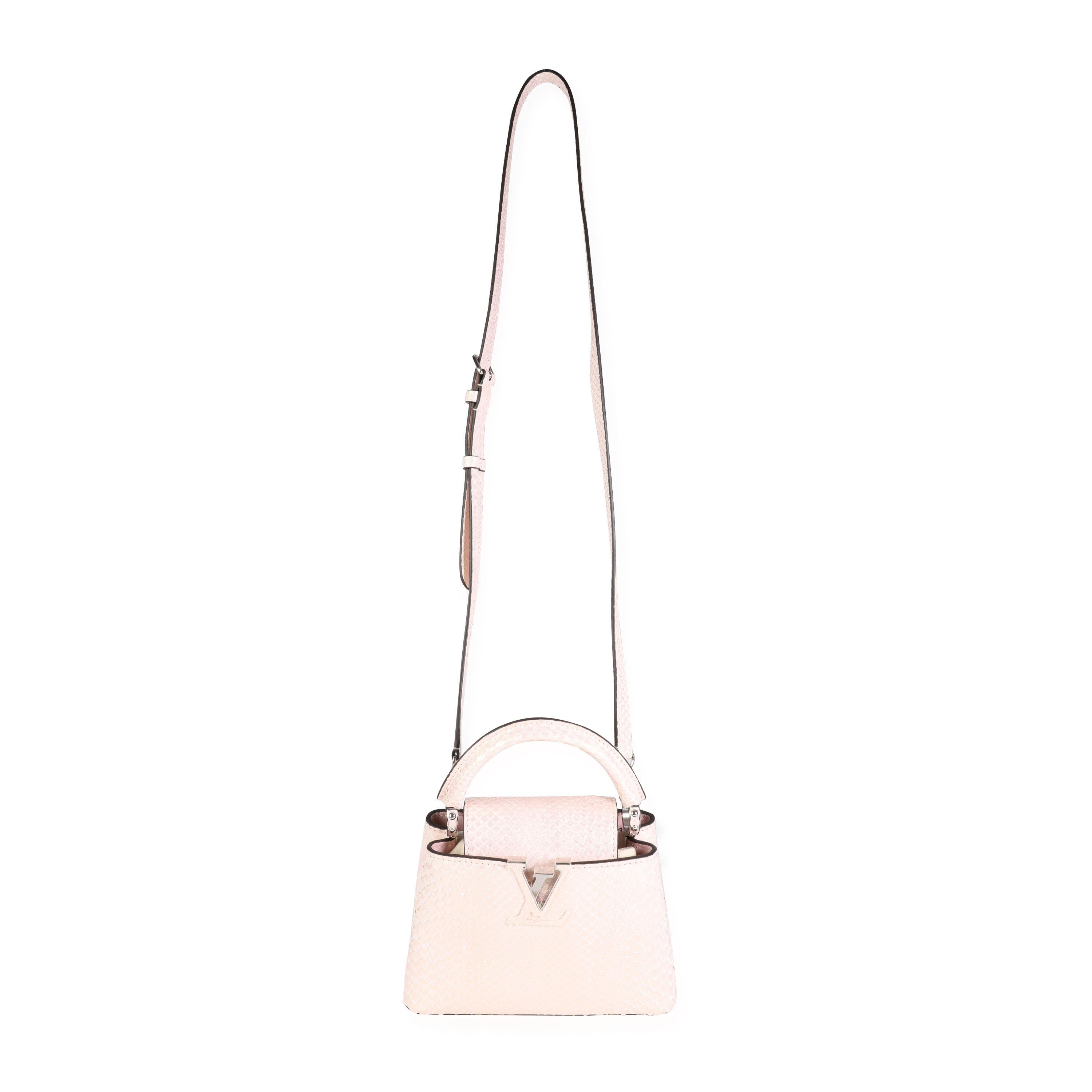 Listing Title: Louis Vuitton Iridescent Pink Python Mini Capucines
SKU: 115513
Condition: Pre-owned (3000)
Handbag Condition: Mint
Condition Comments: Mint Condition. No visible signs of wear. Final sale. Please note: this item can not be shipped to