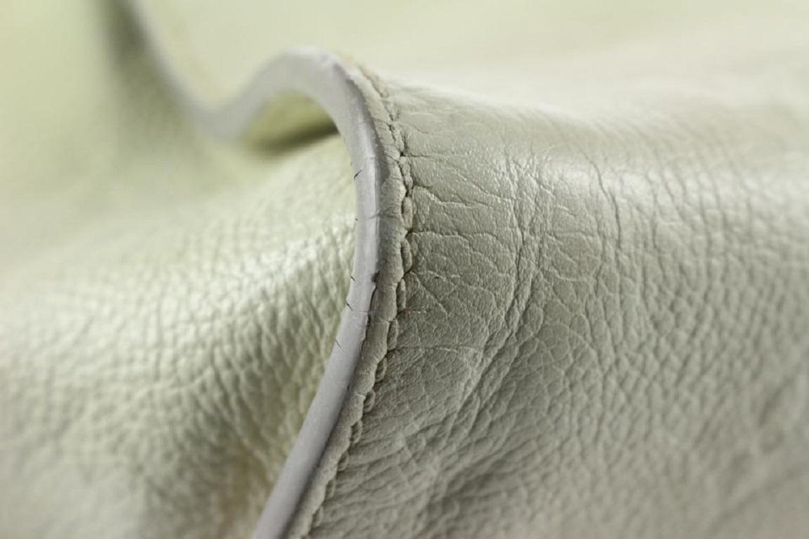 Louis Vuitton - Sac convertible Lumineuse PM 2way en cuir ivoire Empreinte avec fermeture éclair en vente 5