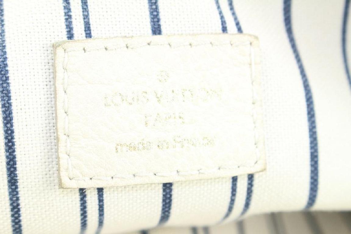 Louis Vuitton - Sac convertible Lumineuse PM 2way en cuir ivoire Empreinte avec fermeture éclair en vente 1