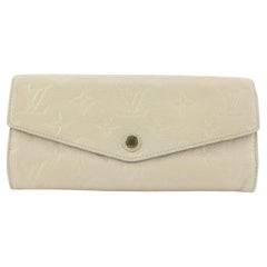 Vintage Louis Vuitton Ivory Empreinte Sarah Curieuse Long Flap Wallet 88lvs427