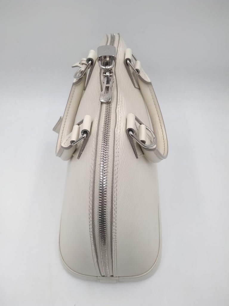 Louis Vuitton Ivory Epi Leather Alma PM Bag with Lock, Silver Hardware