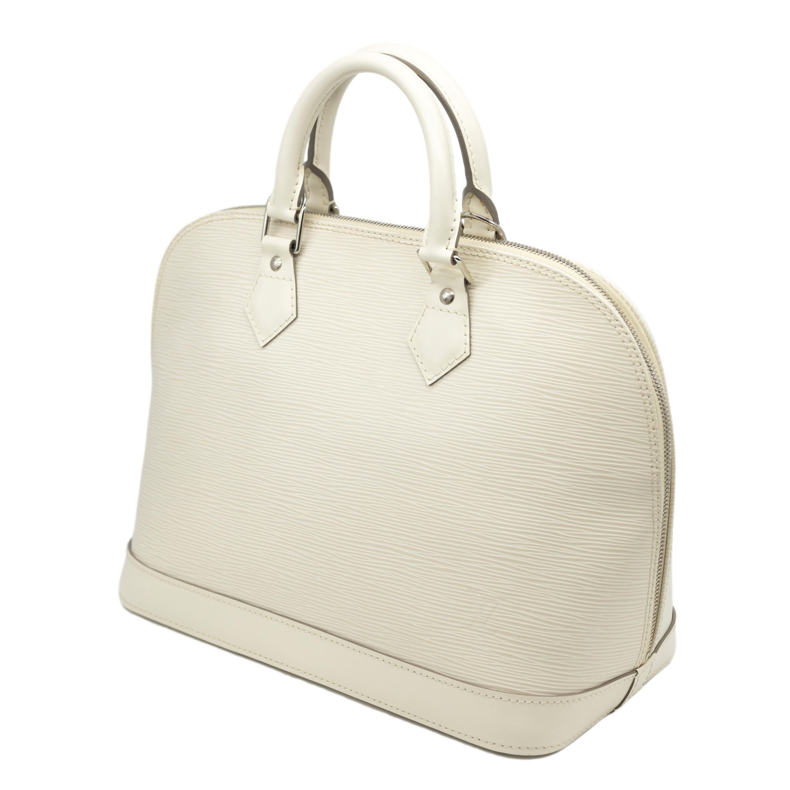 Louis Vuitton Ivory EPI Leather Alma PM Top Handle Bag, 2008. The Louis Vuitton Alma is a classic closet staple, first introduced and inspired by the architect of the Art Deco era of the early 1930's. Originally designed by Gaston-Louis Vuitton, the