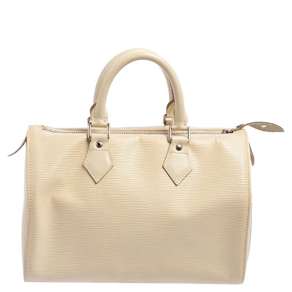 Titled as one of the greatest handbags in the history of luxury fashion, the Speedy from Louis Vuitton was first created for everyday use as a smaller version of their famous Keepall bag. This Speedy comes crafted from signature Epi leather with two