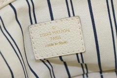 Louis Vuitton Ivory Neige Monogram Empreinte Leather Artsy MM Hobo Bag