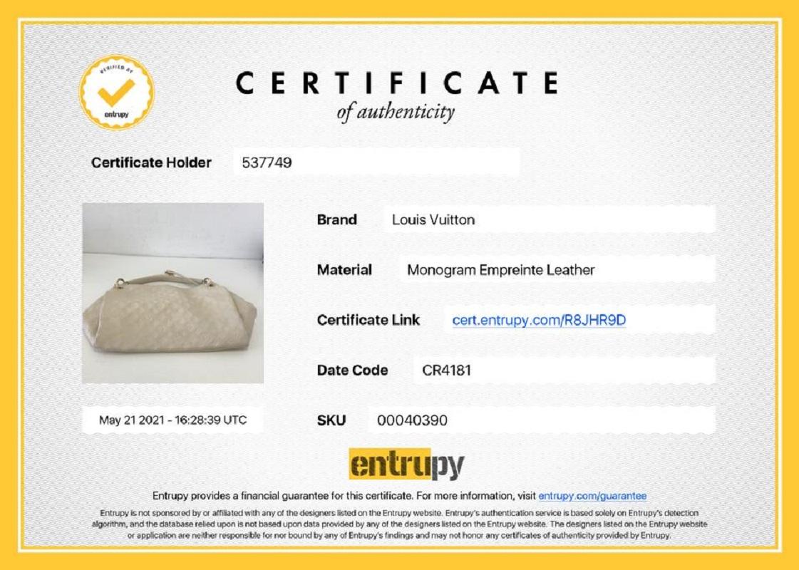 Louis Vuitton - Sac hobo Artsy MM en cuir ivoire, beige et ivoire avec monogramme Empreinte Pour femmes en vente