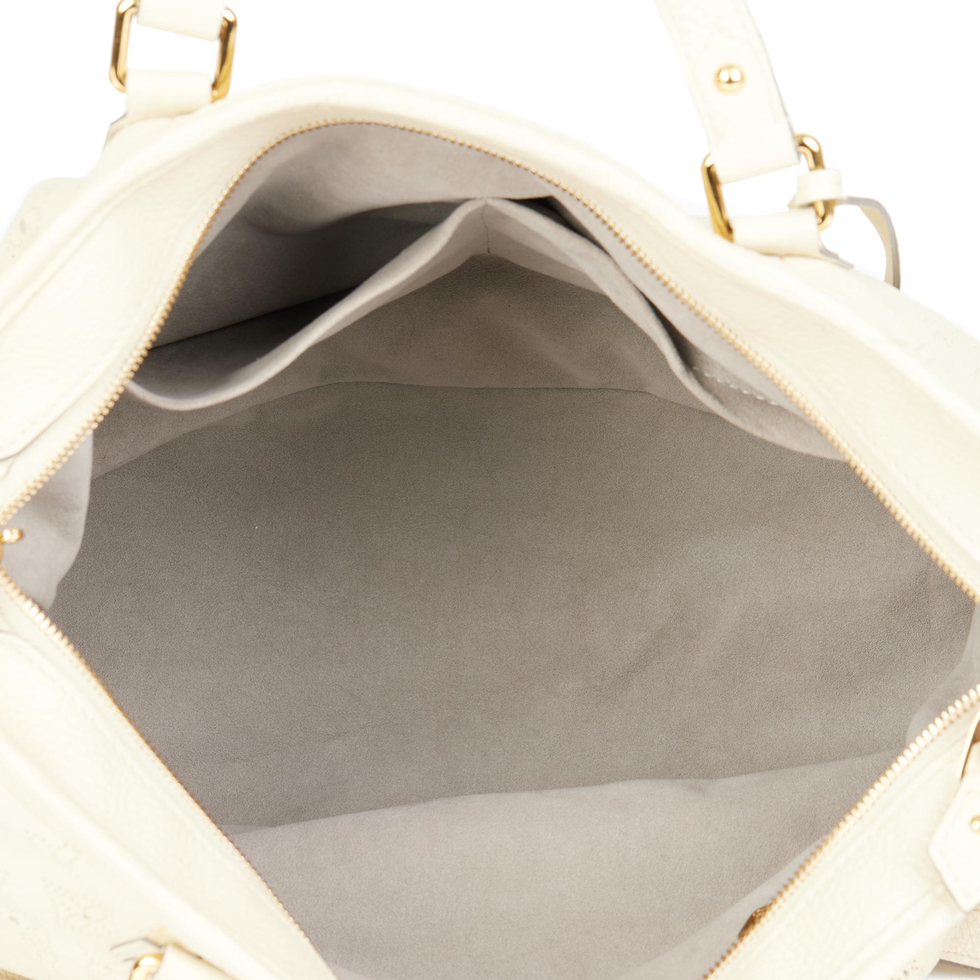 LOUIS VUITTON Ivory Perforated Mahina Leather Stellar PM 6