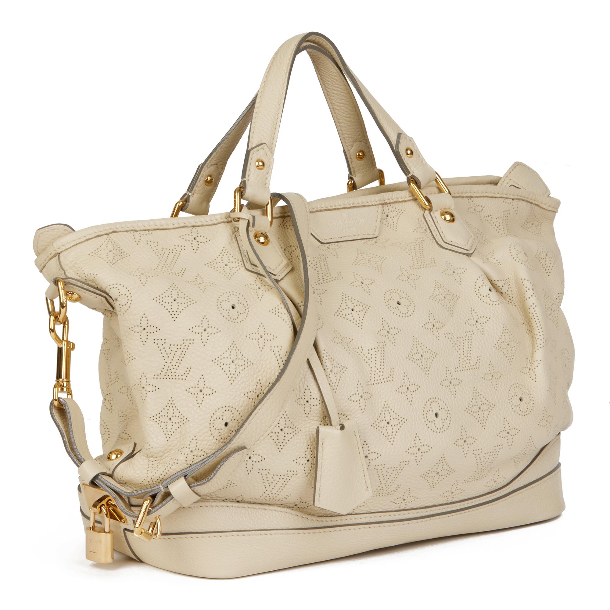 LOUIS VUITTON
Ivory Perforated Mahina Leather Stellar PM

Xupes Reference: CB681
Serial Number: AR3190
Age (Circa): 2010
Accompanied By: Louis Vuitton Dust Bag, Clochette, Keys
Authenticity Details: Date Stamp (Made in France)
Gender: Ladies
Type: