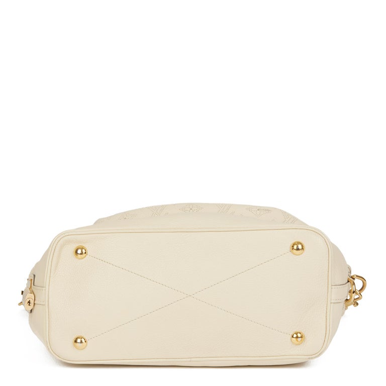LOUIS VUITTON Ivory Perforated Mahina Leather Stellar PM at 1stDibs