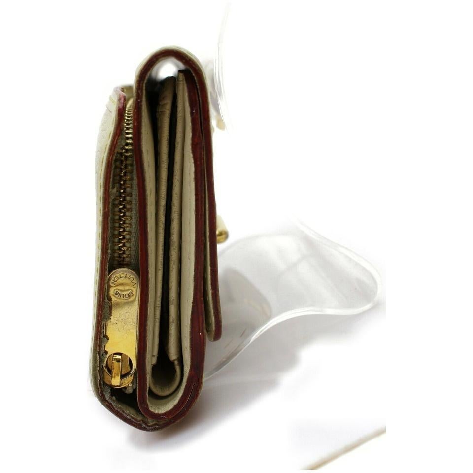 Louis Vuitton Ivory Suhali Leather Le Somptueux Compact Portefeuille Wallet In Good Condition For Sale In Dix hills, NY