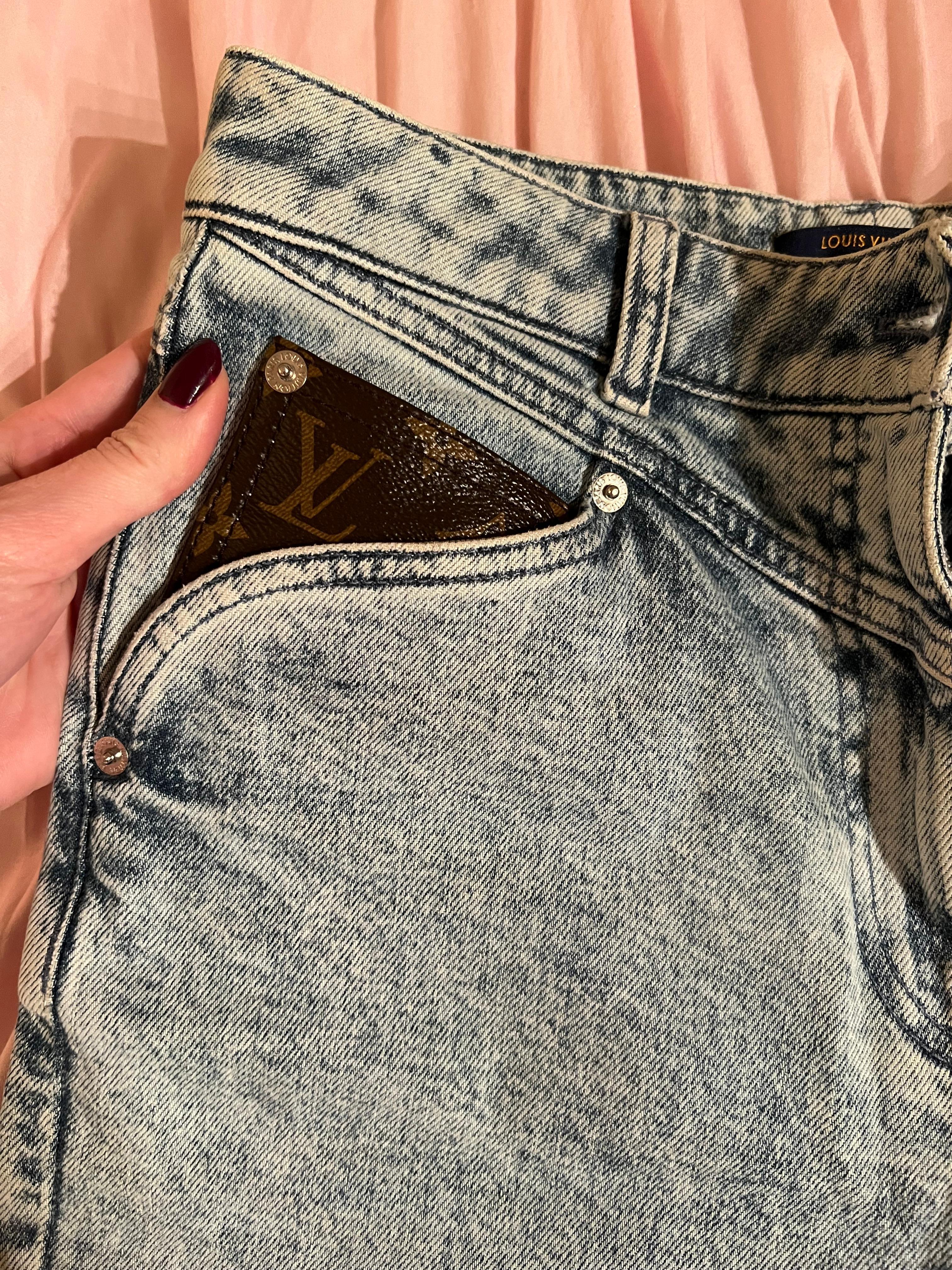 Louis Vuitton Jeans With LV leather Logo On The Back Size 36. Excellent condition.