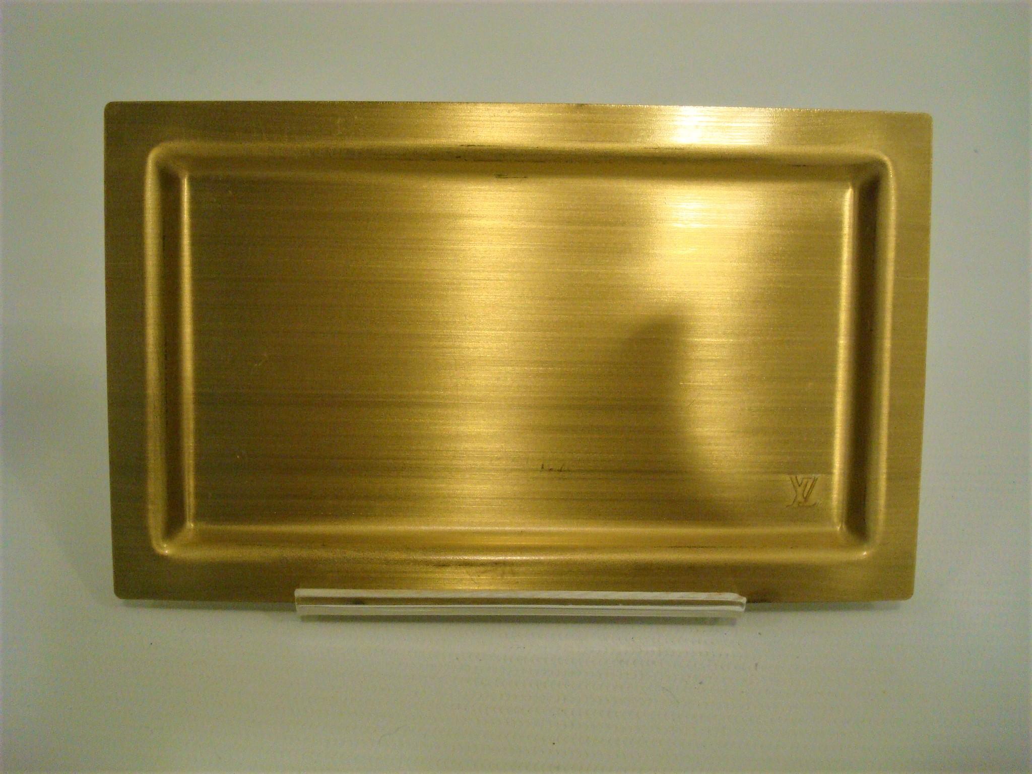 Rare to see Louis Vuitton Small Tray. Very chic
Louis Vuitton Jewelry Dish or a Personal Cards / Keys / Phone / Coins Plate
This piece is a handsome Tray. Can be use as a jewelry dish or a personal desk cards plate. Perfect size. Trinket Tray / Vide