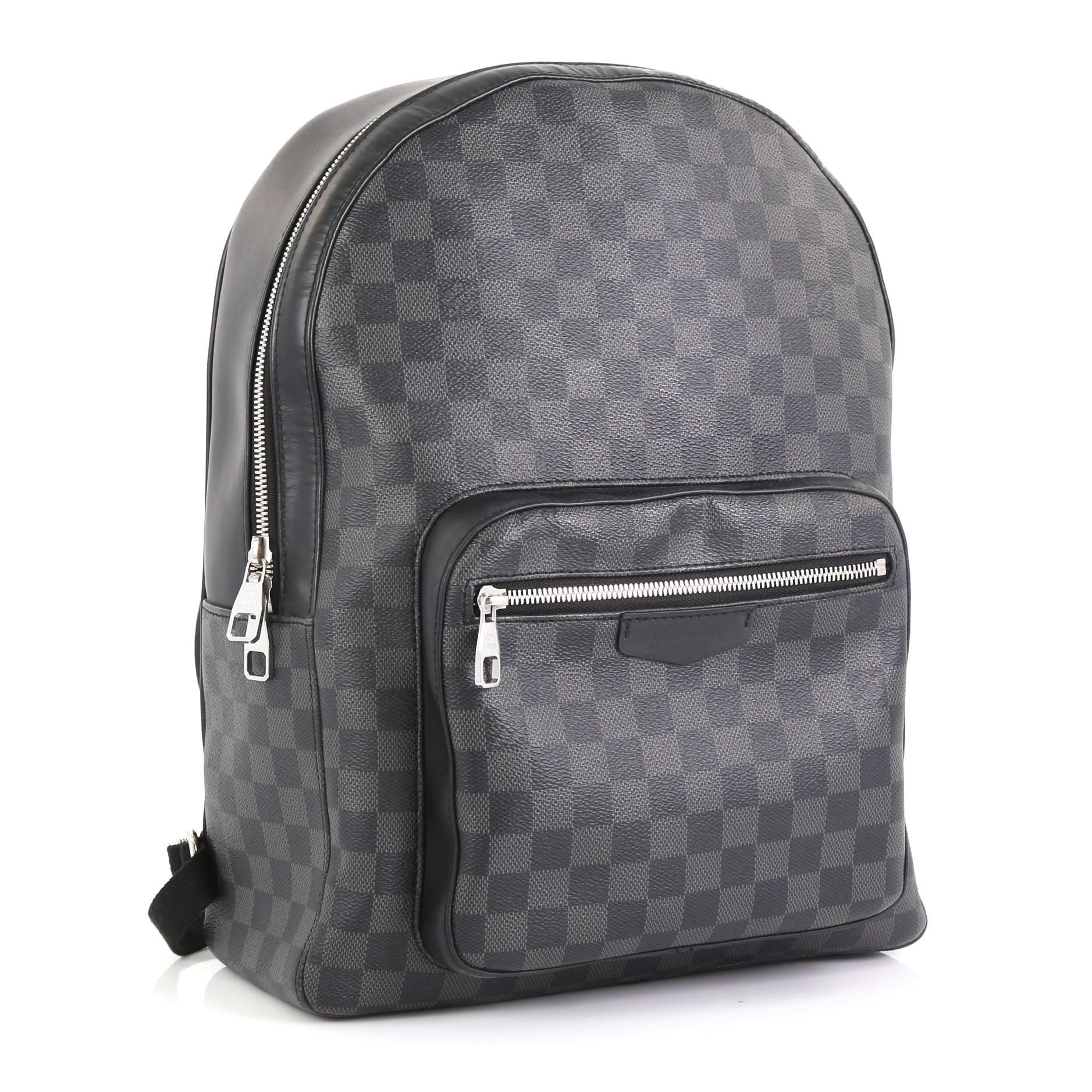 This Louis Vuitton Josh Backpack Damier Graphite, crafted in damier graphite, features adjustable backpack straps, exterior front zip pocket and silver-tone hardware. Its zip closure opens to a black fabric interior. Authenticity code reads: SD1117.