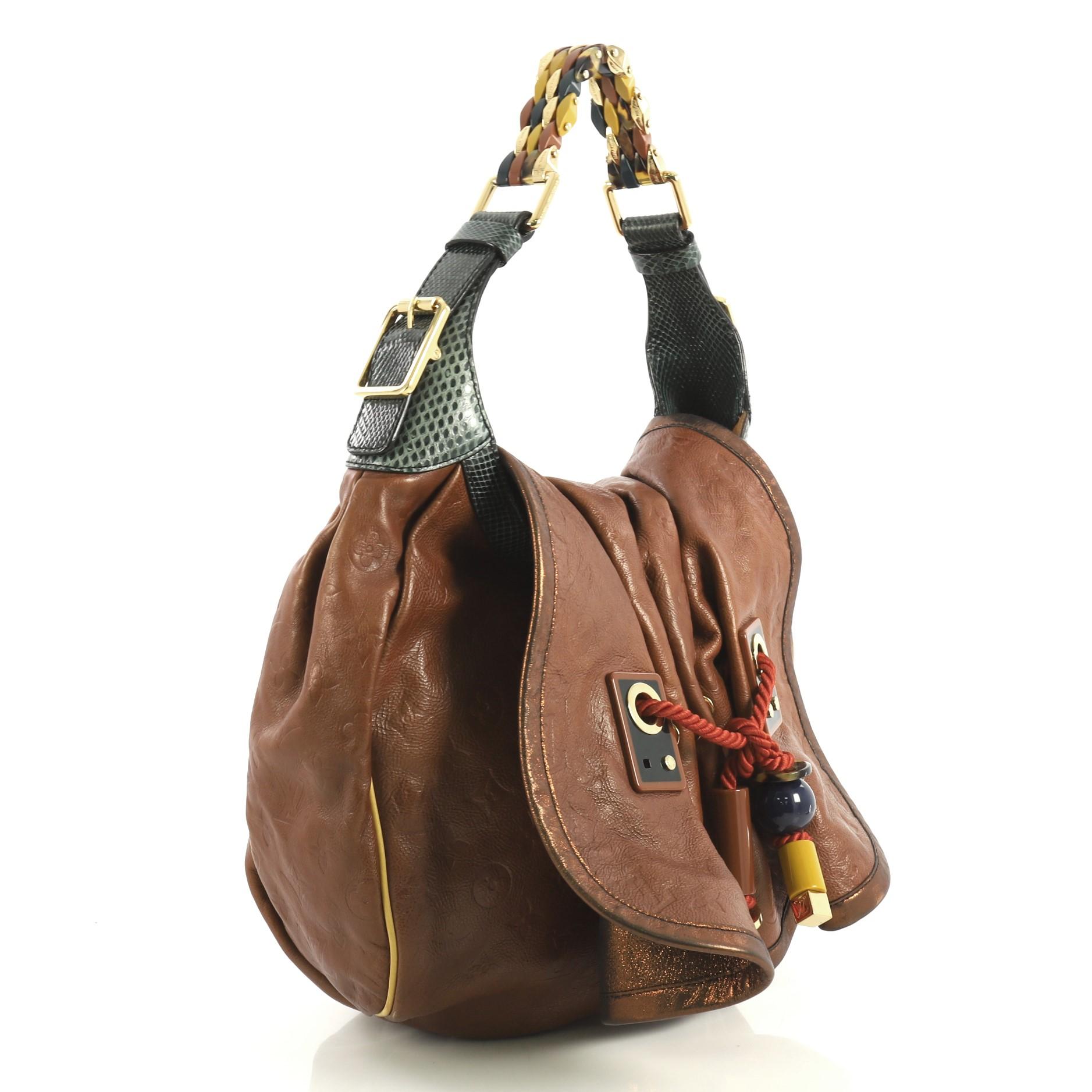This Louis Vuitton Kalahari Handbag Limited Edition Monogram Epices GM, crafted from brown monogram leather, features pleated front details with drawstring rope accents, polished multicolor resin beads, metal and resin shoulder strap with genuine