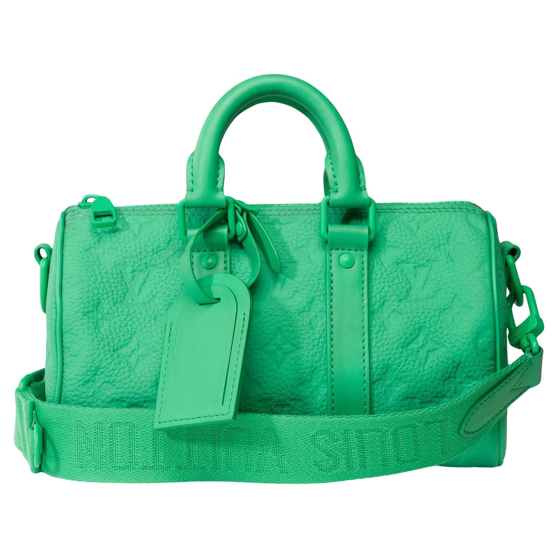 Louis Vuitton keepall 25 strap shoulder bag in green Taurillon embossed leather