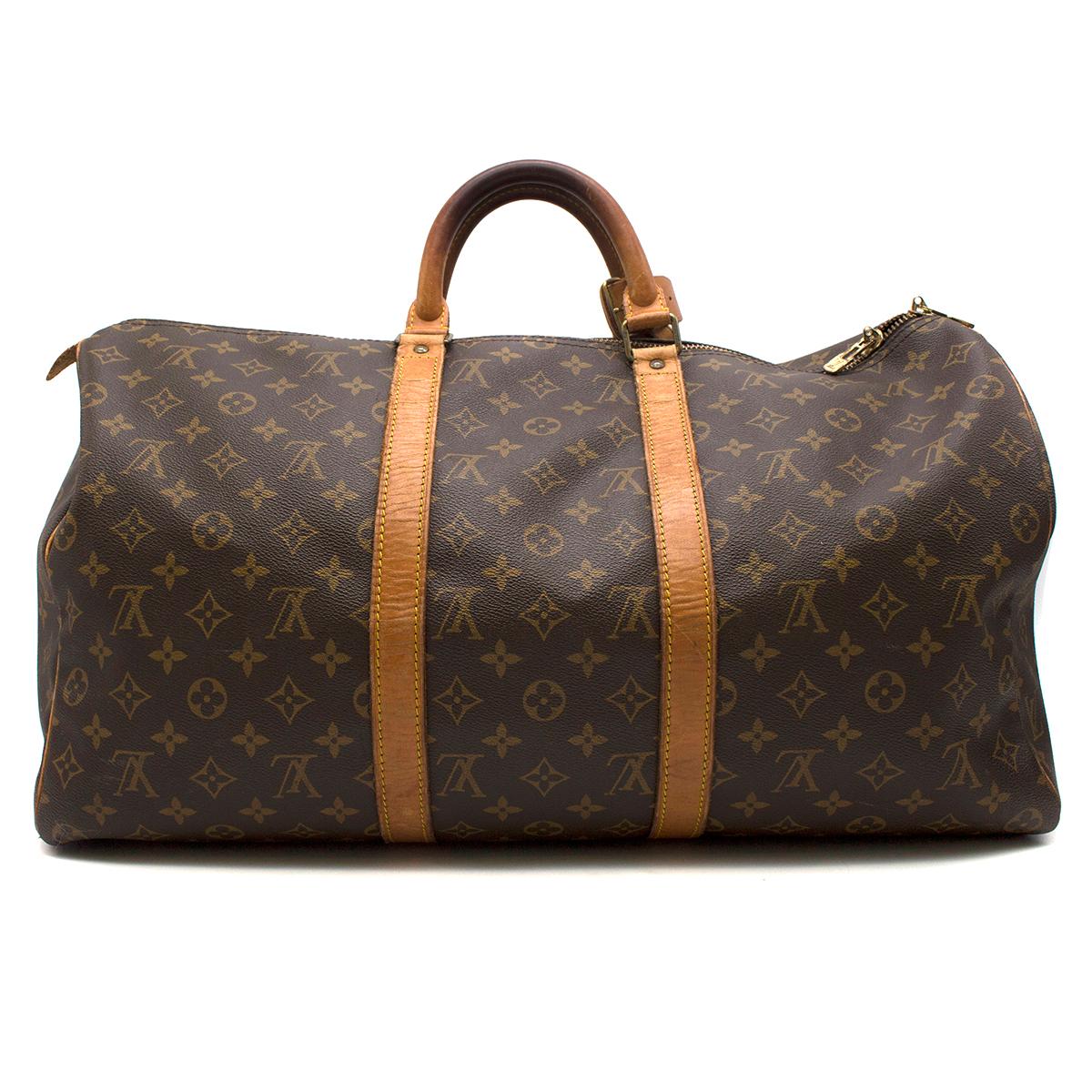 Louis Vuitton Keepall 50 Bandouliere bag

-Coated brown canvas
-Monogrammed signature Louis Vuitton pattern
-Zip closure 
-Rounded handles 
-Handle trimmings in natural leather
-Sophisticated hand carry
-Gold tone hardware
-Interior canvas