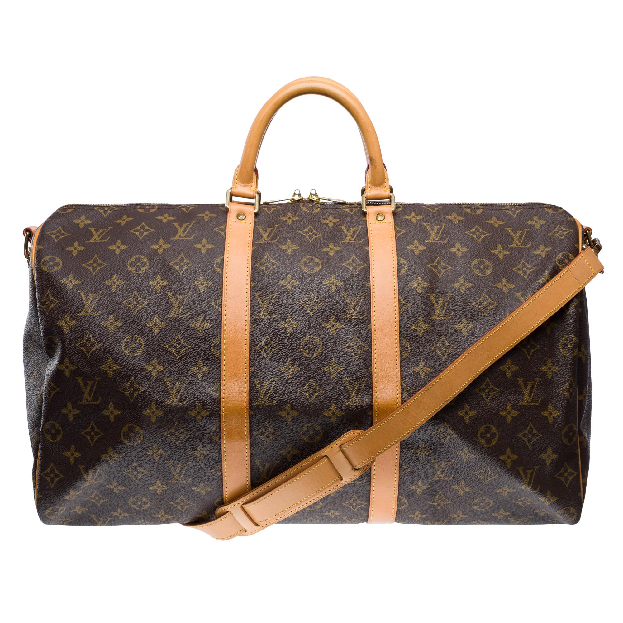 Very​ ​chic​ ​Louis​ ​Vuitton​ ​Keepall​ ​50​ ​shoulder​ ​strap​ ​travel​ ​bag​ ​in​ ​coated​ ​monogram​ ​canvas​ ​and​ ​brown​ ​leather,​ ​with​ ​gold​ ​metal​ ​trim,​ ​double​ ​brown​ ​leather​ ​handles,​ ​removable​ ​adjustable​ ​brown​ ​leather​